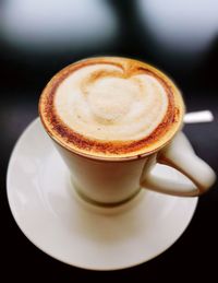 High angle view of cappuccino on table
