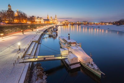 View of illuminated city at waterfront