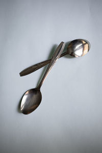 High angle view of wineglass on table against white background