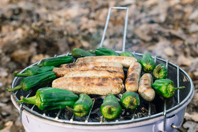 High angle view of meat on barbecue