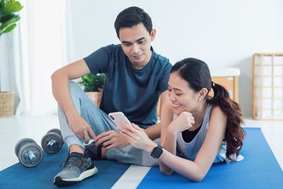 Young couple looking at camera