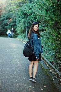 Full length of woman walking in park