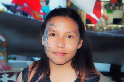 Portrait of girl with face paint