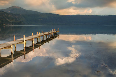 Scenic shot of pier over calm lake