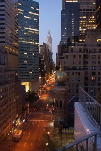 Buildings in city at night