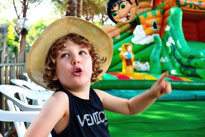 Portrait of cute boy wearing hat