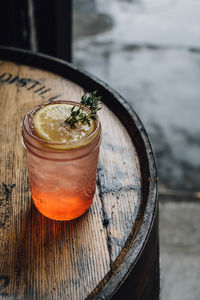 Strawberry thyme lemon cocktail drink in mason jam jar summertime