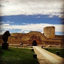 View of landscape against cloudy sky