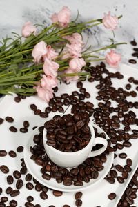 High angle view of coffee served on table