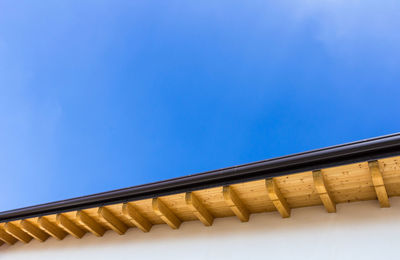 Low angle view of built structure against blue sky