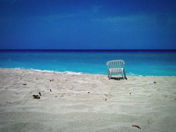 Scenic view of sea against blue sky