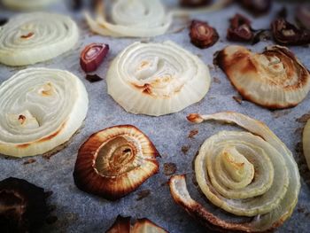 Full frame shot of roasted onions on marble