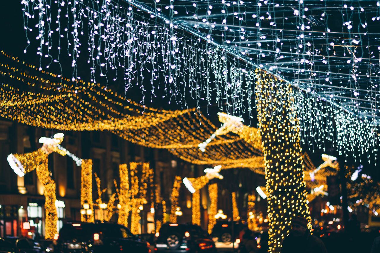 ILLUMINATED CHRISTMAS LIGHTS AND BUILDINGS IN CITY