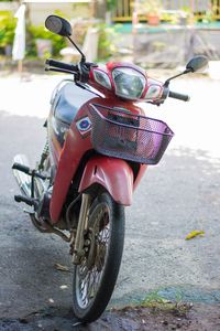Close-up of bicycle parked on street