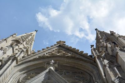 Low angle view of ornate building against sky