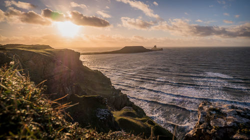 Scenic view of sea against sky during sunset