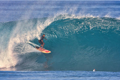 Man surfing in sea