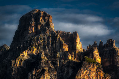 The mountain sassongher at sunrise in a summer morning, dolomites - italian alps