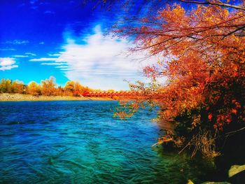 Scenic view of sea against cloudy sky