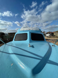 Car against blue sky