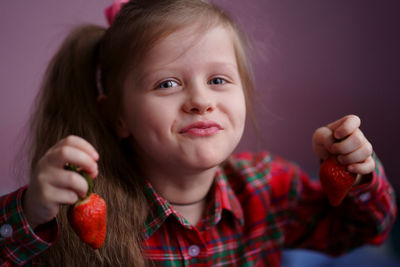 Girl with strawberry berry