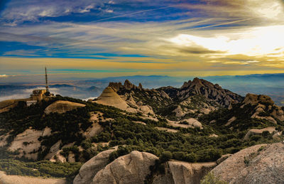 Scenic view of mountains against sky during sunset