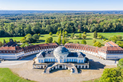 Built structure on landscape against the sky