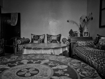 Close-up of sofa on table at home