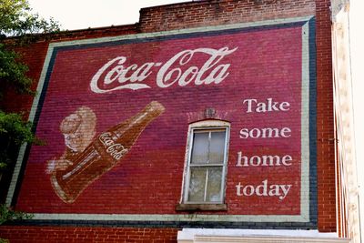 Low angle view of text on building