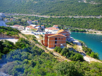 High angle view of buildings and sea