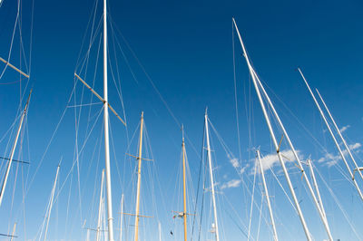 Masts against sky