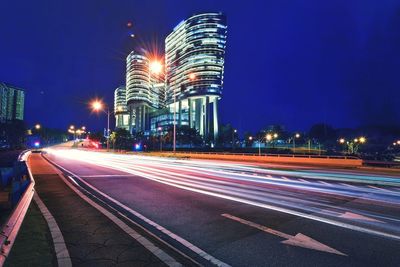 Light trails on road at night