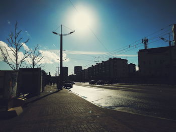 Street in city against sky