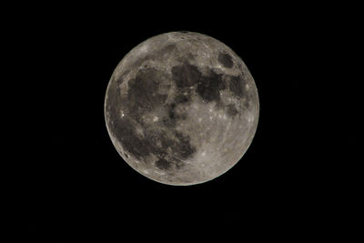 Low angle view of moon against sky at night