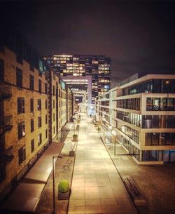 Illuminated buildings in city at night