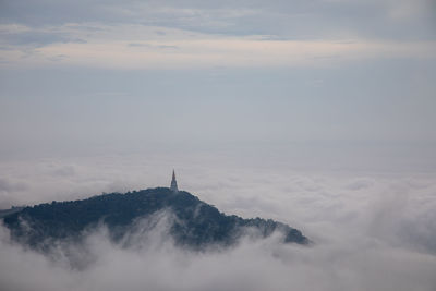 View of city against cloudy sky