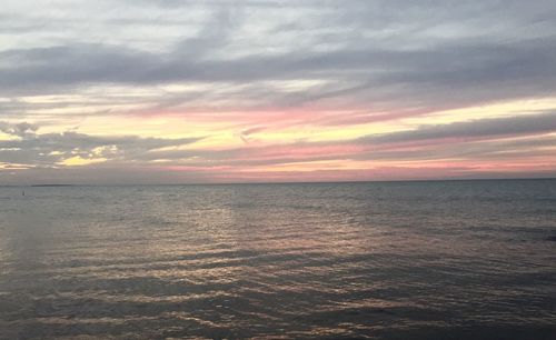 Scenic view of sea at sunset