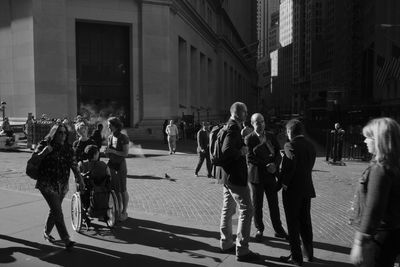 People on street in city