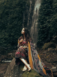 Woman looking at a forest