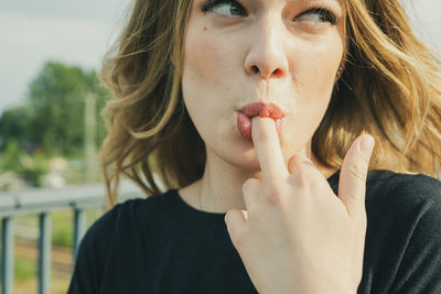 Close-up portrait of young woman