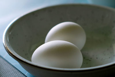 Two boiled eggs in the white plate. the health breakfast 