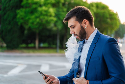 Young man using mobile phone