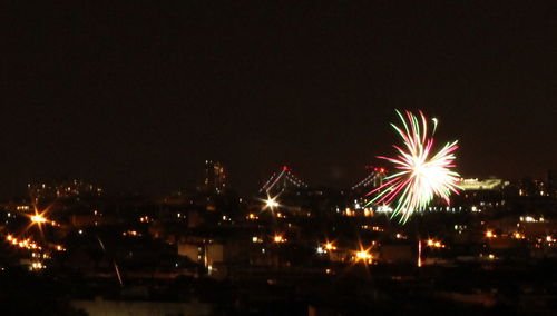 Firework display at night