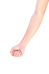 Close-up of hand over white background