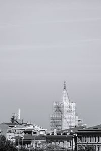 High section of ship moored at harbor against sky