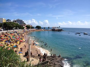 High angle view of people on beach against sky