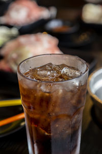 Close-up of ice cream in glass on table