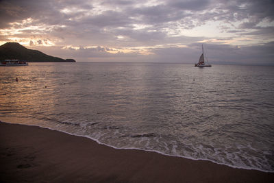 Scenic view of sea against sky during sunset