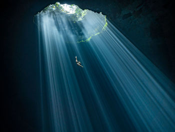 Illuminated light trails underwater 