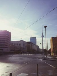 Buildings in city against sky